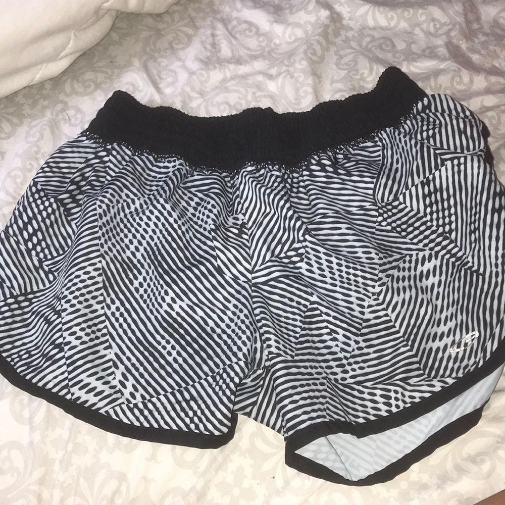 black and white designed athletic shorts